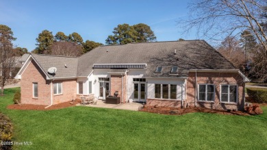 Experience luxury living in this exquisite home nestled in the on Sound Golf Links at Albemarle Plantation in North Carolina - for sale on GolfHomes.com, golf home, golf lot