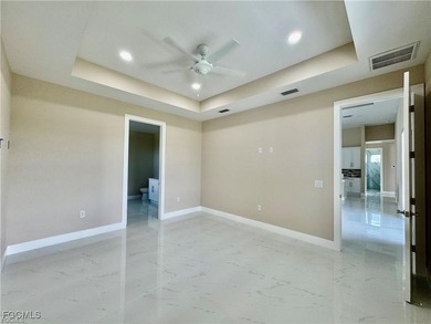 **Stunning New Construction Home in Prime Location!** Welcome to on Burnt Store Golf Club in Florida - for sale on GolfHomes.com, golf home, golf lot