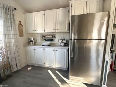 This charming cottage-style mobile home is located in the serene on Copperleaf Golf Club in Florida - for sale on GolfHomes.com, golf home, golf lot