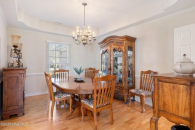 Experience luxury living in this exquisite home nestled in the on Sound Golf Links at Albemarle Plantation in North Carolina - for sale on GolfHomes.com, golf home, golf lot