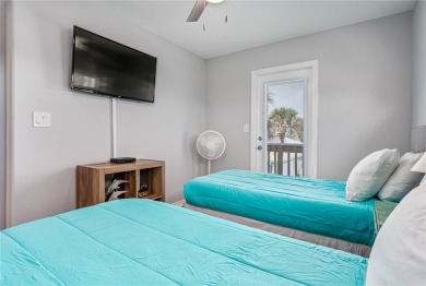 This four bedroom, three bathroom end unit at Gulfside Condos is on Palmilla Beach Golf Club in Texas - for sale on GolfHomes.com, golf home, golf lot