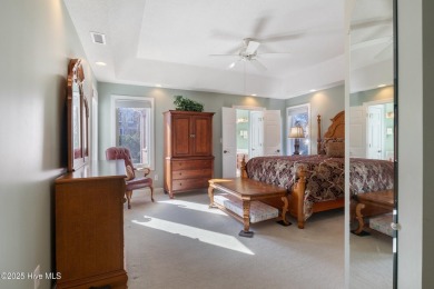 Experience luxury living in this exquisite home nestled in the on Sound Golf Links at Albemarle Plantation in North Carolina - for sale on GolfHomes.com, golf home, golf lot