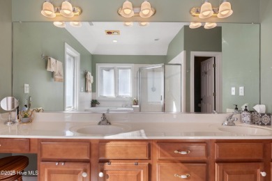 Experience luxury living in this exquisite home nestled in the on Sound Golf Links at Albemarle Plantation in North Carolina - for sale on GolfHomes.com, golf home, golf lot