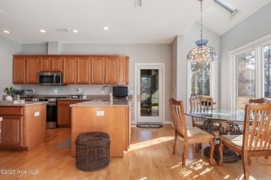 Experience luxury living in this exquisite home nestled in the on Sound Golf Links at Albemarle Plantation in North Carolina - for sale on GolfHomes.com, golf home, golf lot