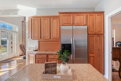 Experience luxury living in this exquisite home nestled in the on Sound Golf Links at Albemarle Plantation in North Carolina - for sale on GolfHomes.com, golf home, golf lot