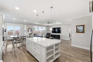 Charming Abbeyville Model located in the vibrant 55+ community on Frisco Lakes Golf Course in Texas - for sale on GolfHomes.com, golf home, golf lot