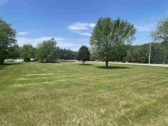 Looking to build... Located in the city of Green Lake near on Tuscumbia Golf & Country Club in Wisconsin - for sale on GolfHomes.com, golf home, golf lot
