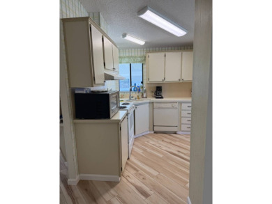 This lovely, manufactured home on leased land is located in Lake on Pine Lakes Country Club in Florida - for sale on GolfHomes.com, golf home, golf lot
