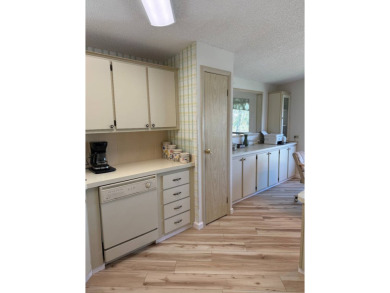 This lovely, manufactured home on leased land is located in Lake on Pine Lakes Country Club in Florida - for sale on GolfHomes.com, golf home, golf lot