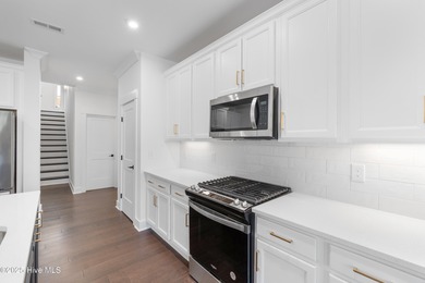 Welcome to this stunning new construction home situated on the on Sound Golf Links at Albemarle Plantation in North Carolina - for sale on GolfHomes.com, golf home, golf lot