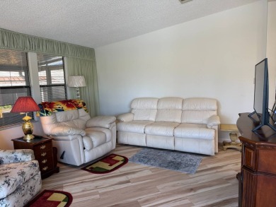 This lovely, manufactured home on leased land is located in Lake on Pine Lakes Country Club in Florida - for sale on GolfHomes.com, golf home, golf lot