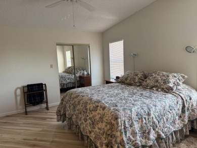 This lovely, manufactured home on leased land is located in Lake on Pine Lakes Country Club in Florida - for sale on GolfHomes.com, golf home, golf lot
