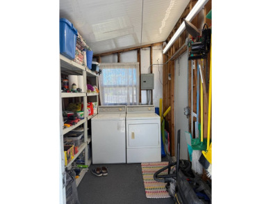 This lovely, manufactured home on leased land is located in Lake on Pine Lakes Country Club in Florida - for sale on GolfHomes.com, golf home, golf lot