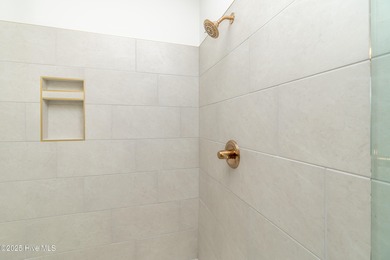 Welcome to this stunning new construction home situated on the on Sound Golf Links at Albemarle Plantation in North Carolina - for sale on GolfHomes.com, golf home, golf lot