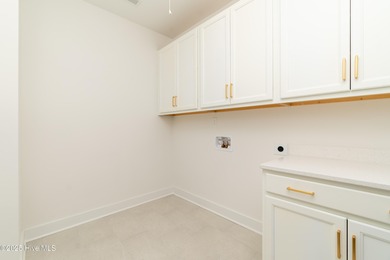 Welcome to this stunning new construction home situated on the on Sound Golf Links at Albemarle Plantation in North Carolina - for sale on GolfHomes.com, golf home, golf lot