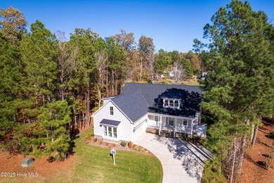 Welcome to this stunning new construction home situated on the on Sound Golf Links at Albemarle Plantation in North Carolina - for sale on GolfHomes.com, golf home, golf lot