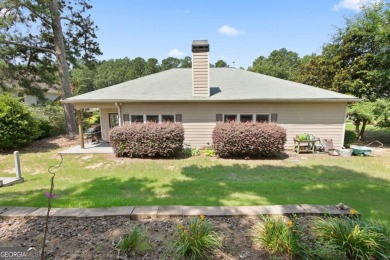Welcome to your dream home in the sought-after Mirror Lake golf on Mirror Lake Golf Club in Georgia - for sale on GolfHomes.com, golf home, golf lot