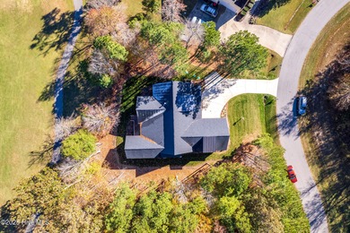 Welcome to this stunning new construction home situated on the on Sound Golf Links at Albemarle Plantation in North Carolina - for sale on GolfHomes.com, golf home, golf lot
