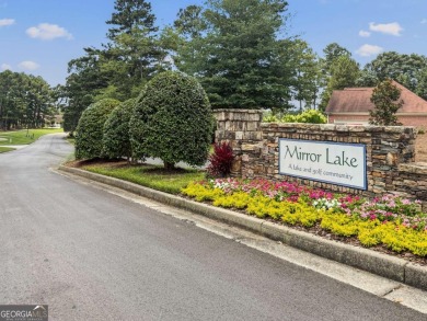 Welcome to your dream home in the sought-after Mirror Lake golf on Mirror Lake Golf Club in Georgia - for sale on GolfHomes.com, golf home, golf lot
