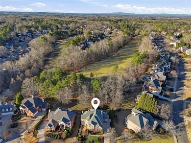 Discover an exceptional opportunity to own a stunning home in on Alpharetta Athletic Club East in Georgia - for sale on GolfHomes.com, golf home, golf lot