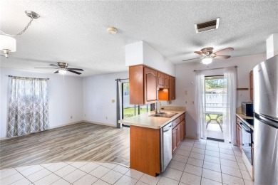 Welcome to your slice of paradise in the highly sought-after on Jacaranda West Country Club in Florida - for sale on GolfHomes.com, golf home, golf lot
