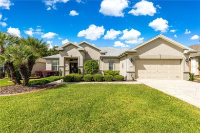 Step into a world of refined elegance and modern comfort in this on Eagle Ridge At Spruce Creek Country Club in Florida - for sale on GolfHomes.com, golf home, golf lot