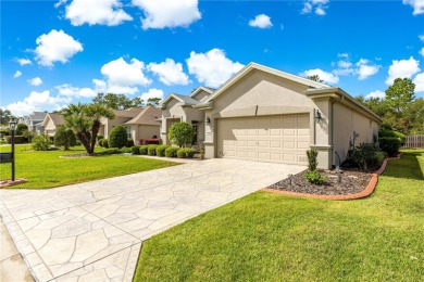 Step into a world of refined elegance and modern comfort in this on Eagle Ridge At Spruce Creek Country Club in Florida - for sale on GolfHomes.com, golf home, golf lot