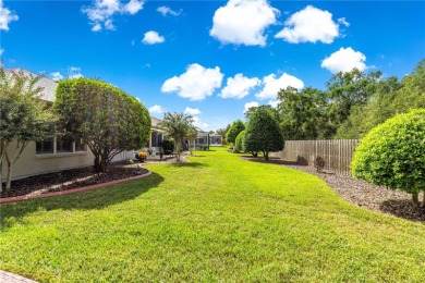 Step into a world of refined elegance and modern comfort in this on Eagle Ridge At Spruce Creek Country Club in Florida - for sale on GolfHomes.com, golf home, golf lot