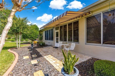 Step into a world of refined elegance and modern comfort in this on Eagle Ridge At Spruce Creek Country Club in Florida - for sale on GolfHomes.com, golf home, golf lot