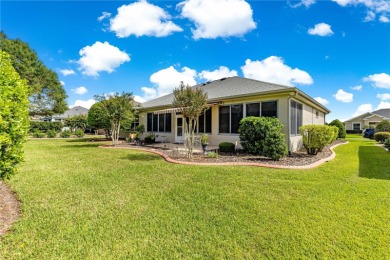 Step into a world of refined elegance and modern comfort in this on Eagle Ridge At Spruce Creek Country Club in Florida - for sale on GolfHomes.com, golf home, golf lot