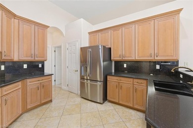 Experience exceptional living in this magnificent estate home in on Naples Lakes Country Club in Florida - for sale on GolfHomes.com, golf home, golf lot