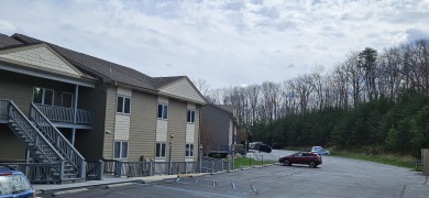 TOP FLOOR RIGHT END UNIT offers fabulous unobstructed water on Mariners Landing Golf and Country Club in Virginia - for sale on GolfHomes.com, golf home, golf lot