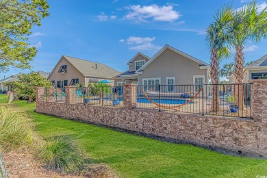 This beautiful Mediterranean-style home is Paradise! Located in on Barefoot Resort and Golf Club  in South Carolina - for sale on GolfHomes.com, golf home, golf lot