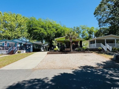 JUST LISTED! BEAUTIFUL 4 BED/3 BATH DBL WIDE BEACH HOUSE ON on Prestwick Country Club in South Carolina - for sale on GolfHomes.com, golf home, golf lot