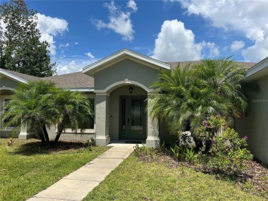 This spacious home is located between two golf courses and two on The Grand Club Cypress Course in Florida - for sale on GolfHomes.com, golf home, golf lot