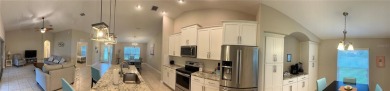 This spacious home is located between two golf courses and two on The Grand Club Cypress Course in Florida - for sale on GolfHomes.com, golf home, golf lot