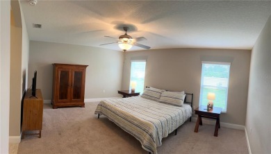 This spacious home is located between two golf courses and two on The Grand Club Cypress Course in Florida - for sale on GolfHomes.com, golf home, golf lot