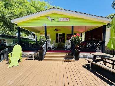 JUST LISTED! BEAUTIFUL 4 BED/3 BATH DBL WIDE BEACH HOUSE ON on Prestwick Country Club in South Carolina - for sale on GolfHomes.com, golf home, golf lot