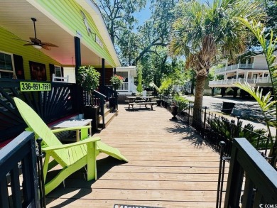 JUST LISTED! BEAUTIFUL 4 BED/3 BATH DBL WIDE BEACH HOUSE ON on Prestwick Country Club in South Carolina - for sale on GolfHomes.com, golf home, golf lot