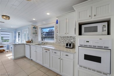 This charming home offers an ideal blend of comfort, style, and on The Dunes Golf and Tennis Club in Florida - for sale on GolfHomes.com, golf home, golf lot