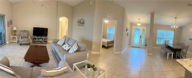 This spacious home is located between two golf courses and two on The Grand Club Cypress Course in Florida - for sale on GolfHomes.com, golf home, golf lot