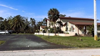 This spacious unit is located in Rotonda West- just minutes to on Rotonda Golf and Country Club The Hills Course in Florida - for sale on GolfHomes.com, golf home, golf lot