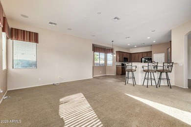 Set on a huge, nearly 12,000-square-foot lot backing to pristine on Estrella Mountain Ranch Golf Course in Arizona - for sale on GolfHomes.com, golf home, golf lot