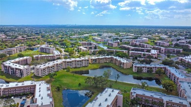 Welcome to this beautifully fully renovated 2nd-floor unit on Sunrise Lakes Phase IV Golf Course in Florida - for sale on GolfHomes.com, golf home, golf lot