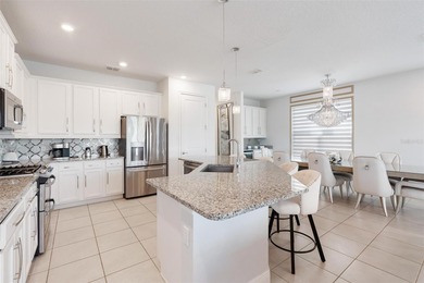 Discover an extraordinary opportunity with this exquisitely on Reunion Resort Golf Course in Florida - for sale on GolfHomes.com, golf home, golf lot