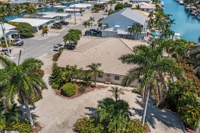 Paradise awaits! Welcome to your 3 bedroom 2 bath dream home in on Key Colony Beach Golf Course in Florida - for sale on GolfHomes.com, golf home, golf lot