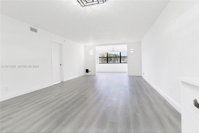 Welcome to this beautifully fully renovated 2nd-floor unit on Sunrise Lakes Phase IV Golf Course in Florida - for sale on GolfHomes.com, golf home, golf lot