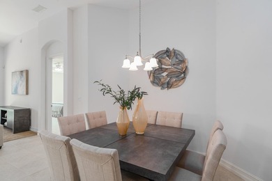 GORGEOUS corner unit - light, bright, and elevated for panoramic on Hammock Bay in Florida - for sale on GolfHomes.com, golf home, golf lot