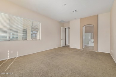 Set on a huge, nearly 12,000-square-foot lot backing to pristine on Estrella Mountain Ranch Golf Course in Arizona - for sale on GolfHomes.com, golf home, golf lot