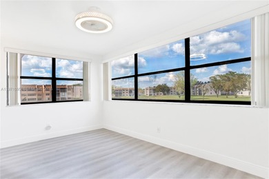 Welcome to this beautifully fully renovated 2nd-floor unit on Sunrise Lakes Phase IV Golf Course in Florida - for sale on GolfHomes.com, golf home, golf lot